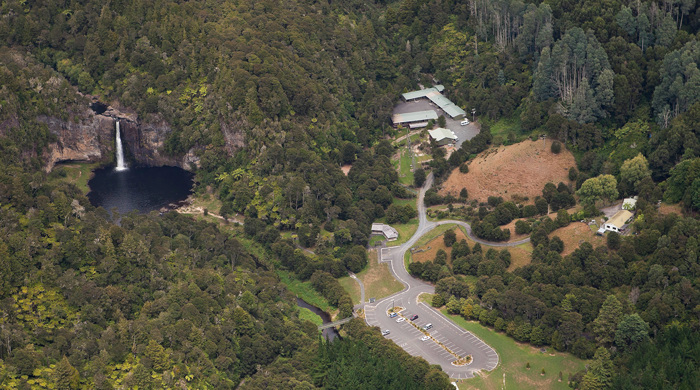 Aerial view of hunua falls and carpark.