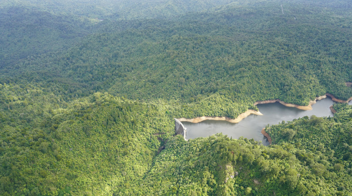 Upper Nihotupu Dam and resevoir surrounded by forests. 